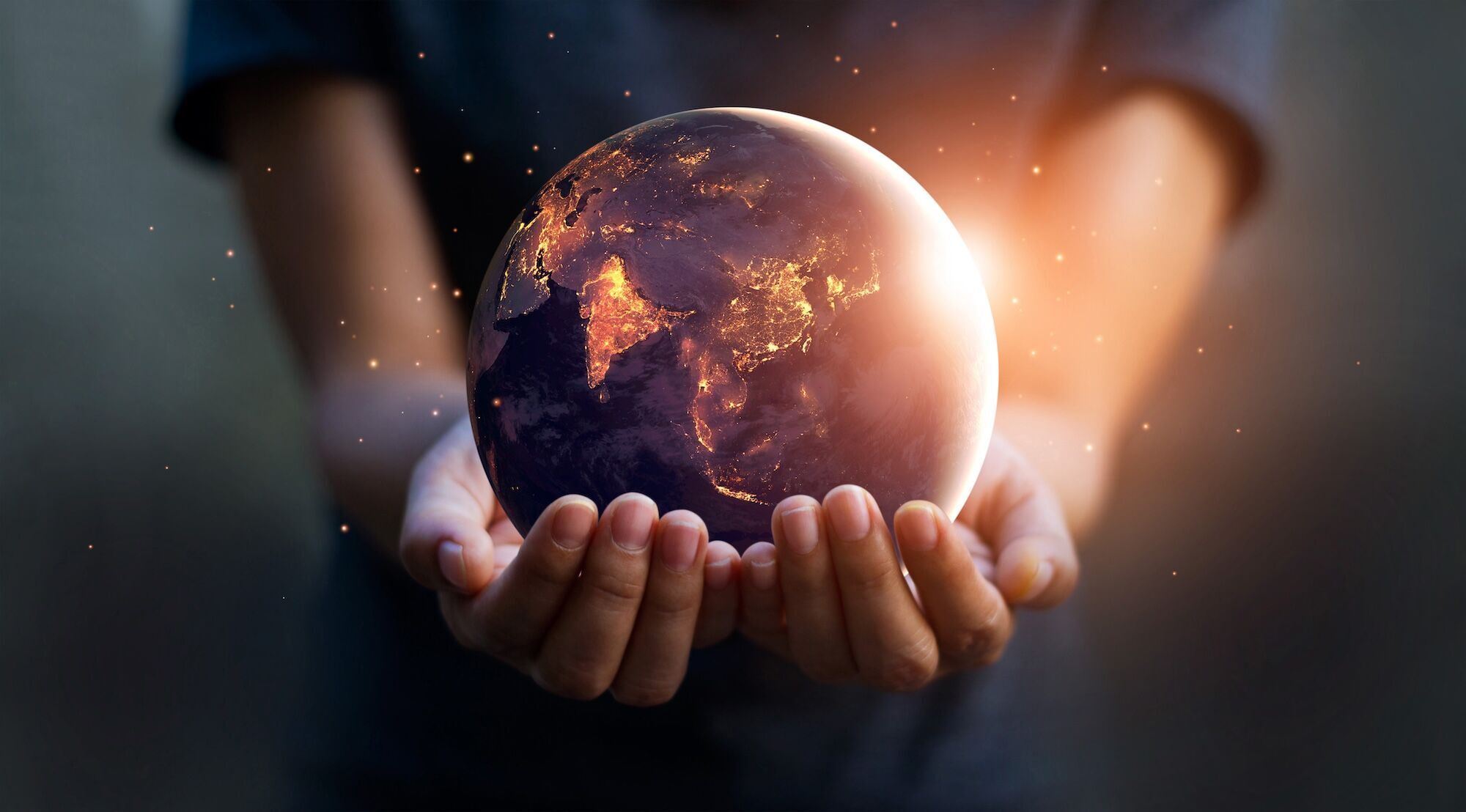 Earth in the hands of a person.