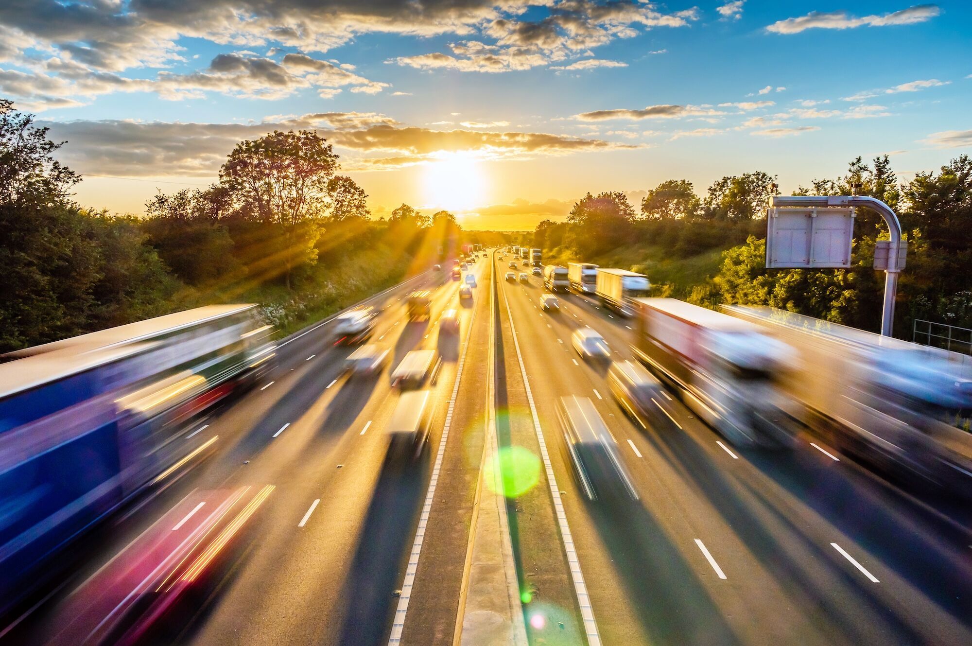 A highway with blurred cars.