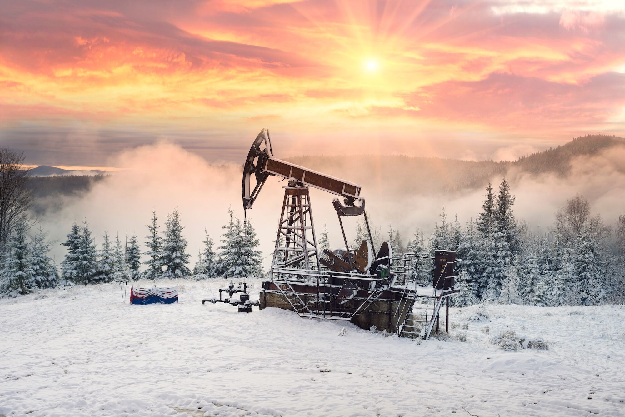 Oil drill in the snow.